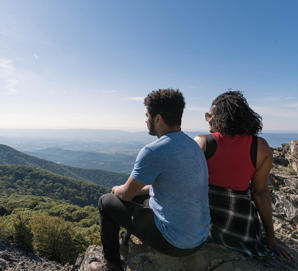 Two Shenandoah National Park visitors on a mountain overlook